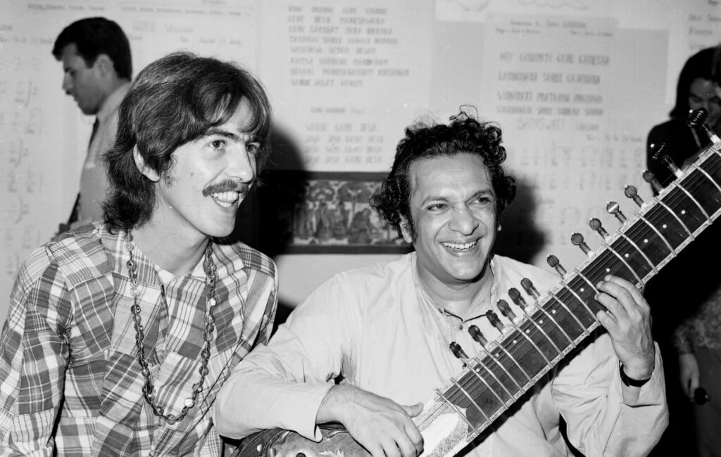 pandit ravi shankar playing sitar with george harrison